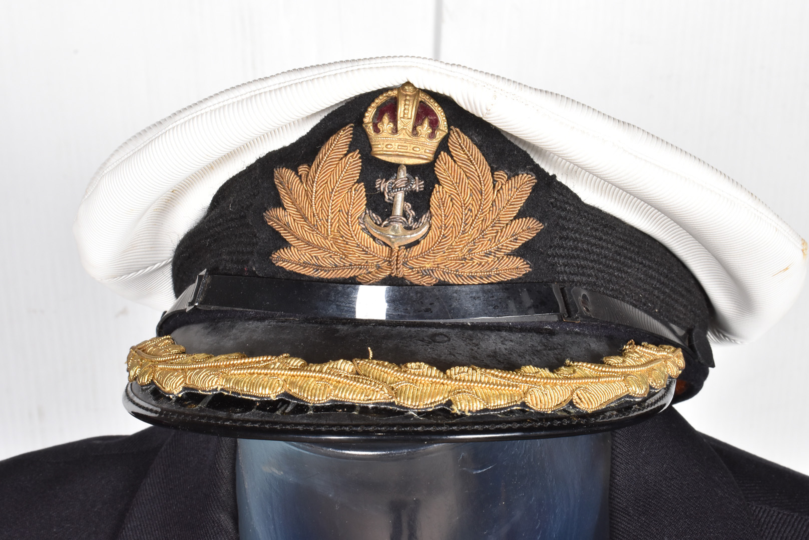 A Naval Commander's Uniform, comprising Jacket, with medal ribbons and badges, trousers, a cap by - Image 3 of 7