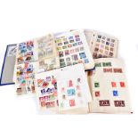 An assortment of Victorian and later British and World stamps, in numerous stock books, including