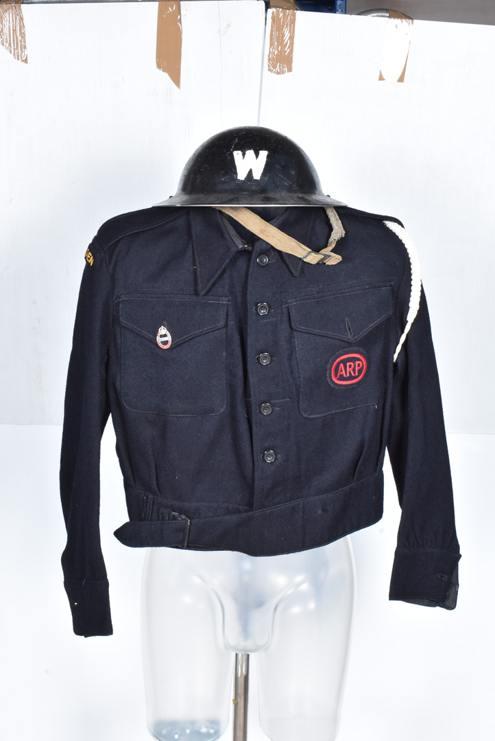 A WWII Civil Defence uniform, comprising of blouse/jacket ARP 59a by Claude Alexander Ltd, size no.