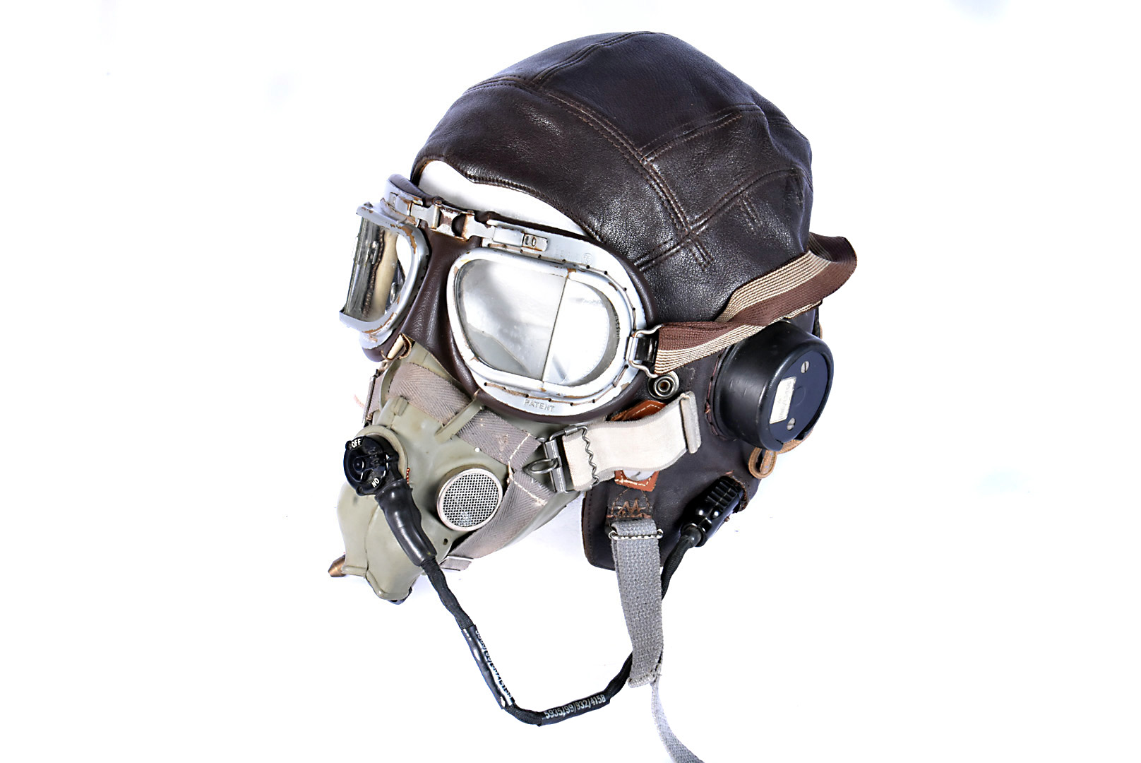 A Type C flying helmet, the brown leather helmet marked with broad arrow to the build in and wired