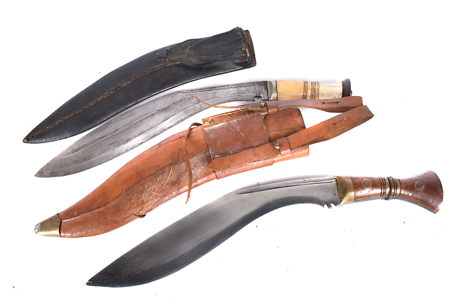 A WWII issue Kukri, dated 37, also with other markings, together with a bone handled Kukri, both