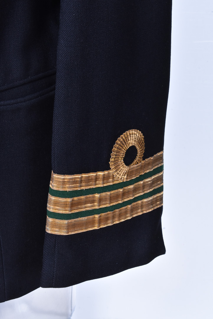 A Naval Commander's Uniform, comprising Jacket, with medal ribbons and badges, trousers, a cap by - Image 2 of 7