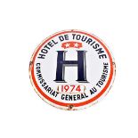 A 1970s French 'Hotel De Tourisme' enamelled iron sign, the circular sign for a 2 Star Hotel, with