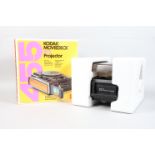 A Kodak Moviedeck 455 K Projector, for 8 & super 8 film, with integral flip out viewing screen, G-