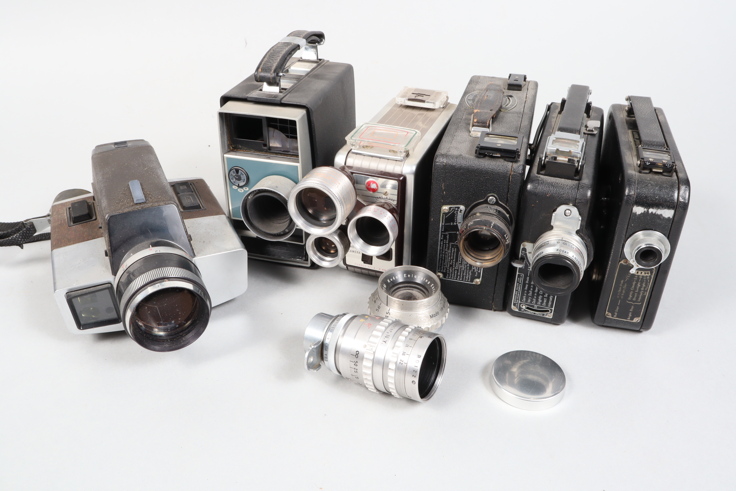 A Group of Kodak Cine Cameras, a Magazine 16mm Cine Kodak, motor runs, body G, with 25mm f/1.9 lens,