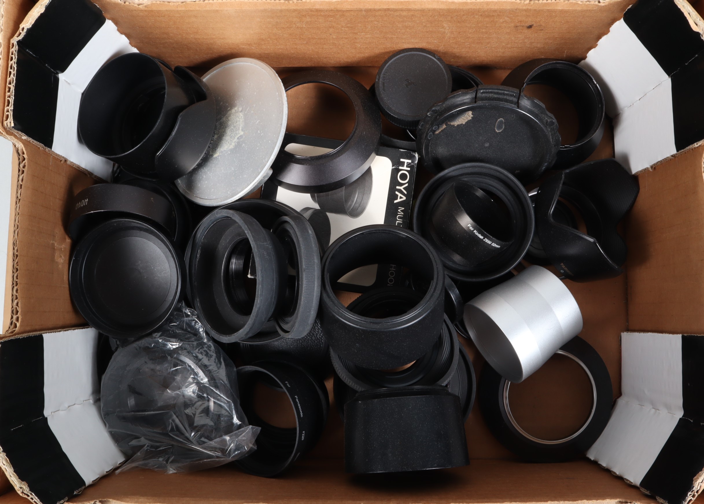 A Tray of Lens Hood and Caps, including Leitz lens caps, rubber hoods, generic maker's, various