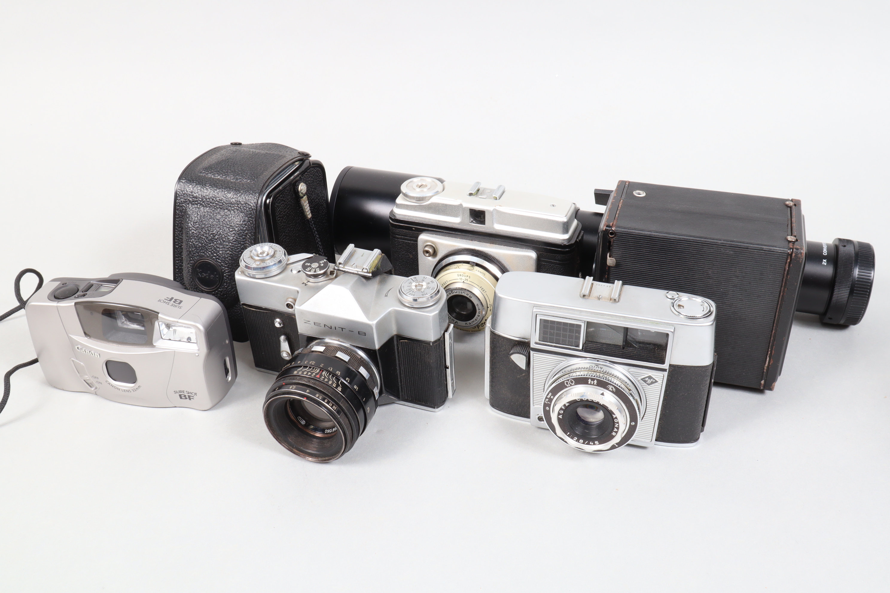 A Small Group of Cameras, including a Zenit B, shutter lever not engaging, with Helios 58mm f/2