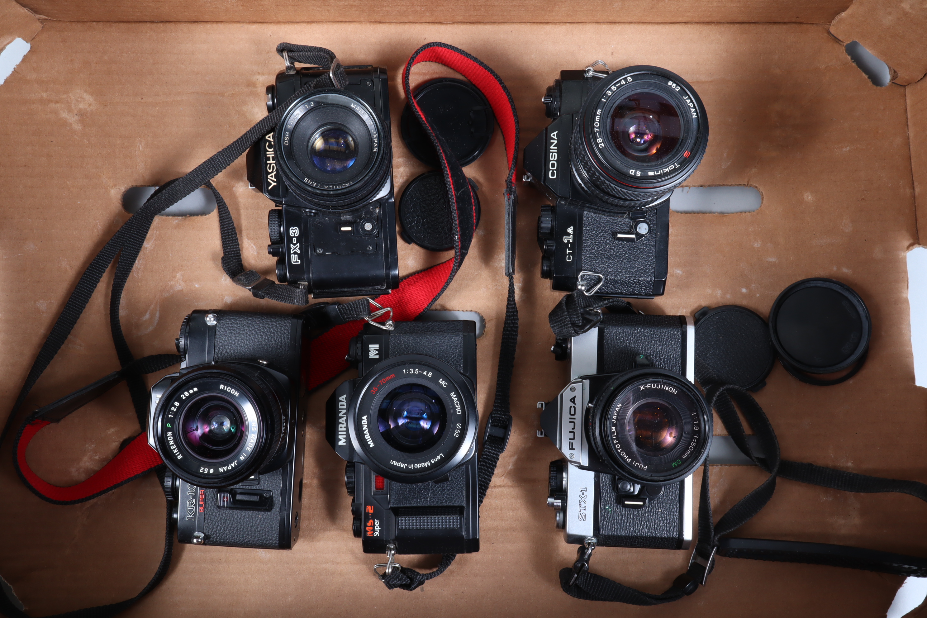 Five SLR Cameras, a Fujica STX-1, shutter working, body G, with X-Fujinon 50mm f/1.9 lens,