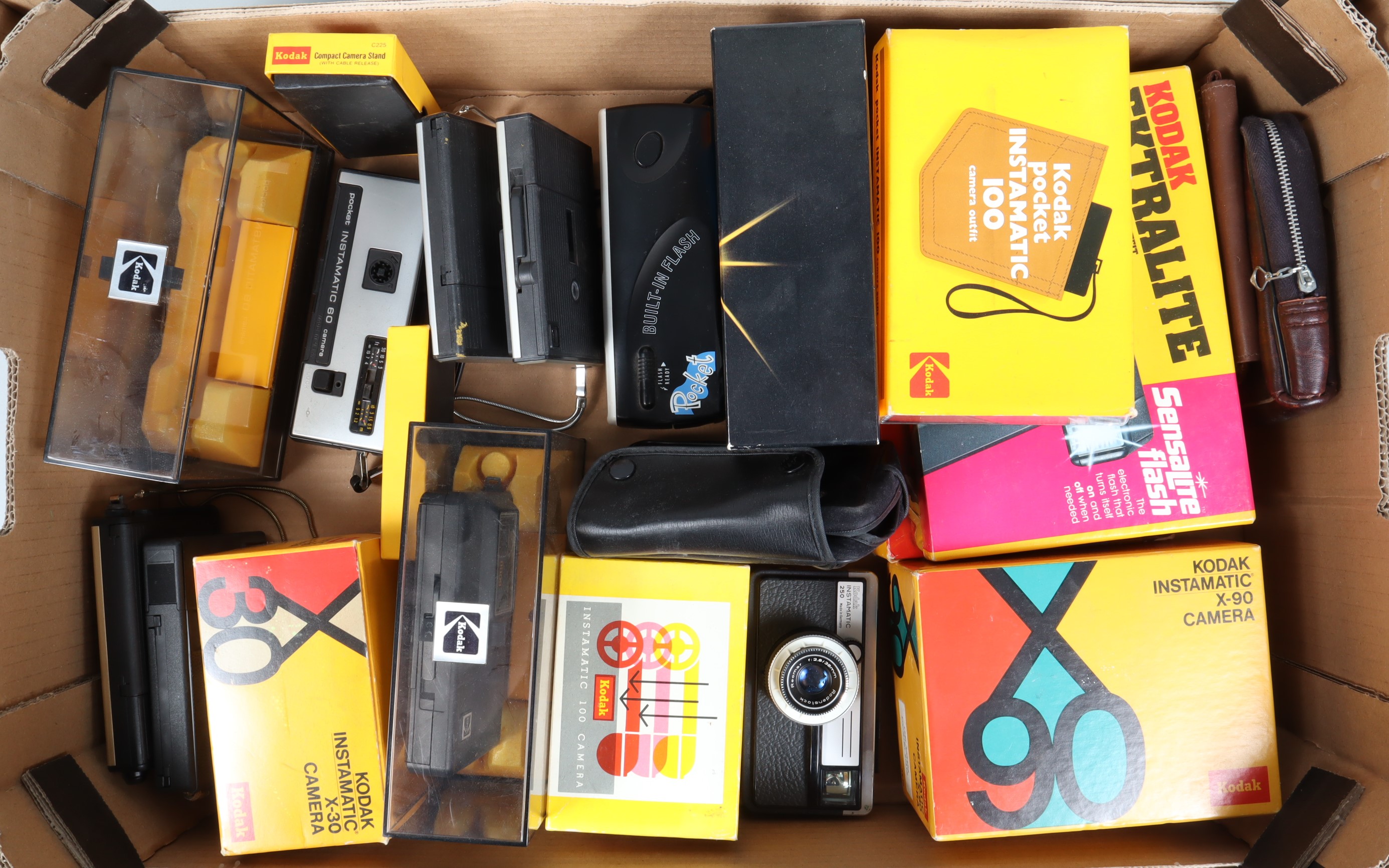 A Tray of Kodak Intamatic and Disc Cameras, an Instamatic X-90, X-30,100, all in maker's boxes, G, A