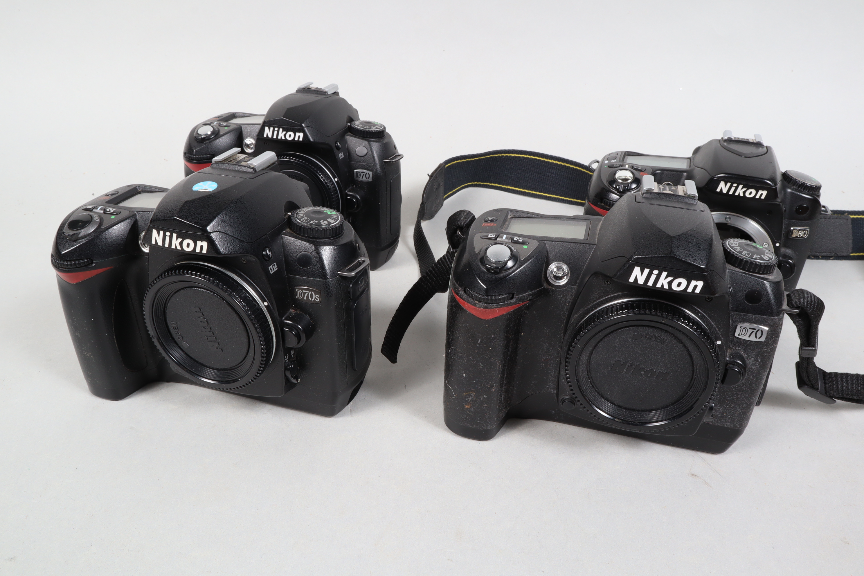 Nikon DSLRs, D70 (2) and D70s (1) bodies, power up and shutters fire, and D80 body, powers up,