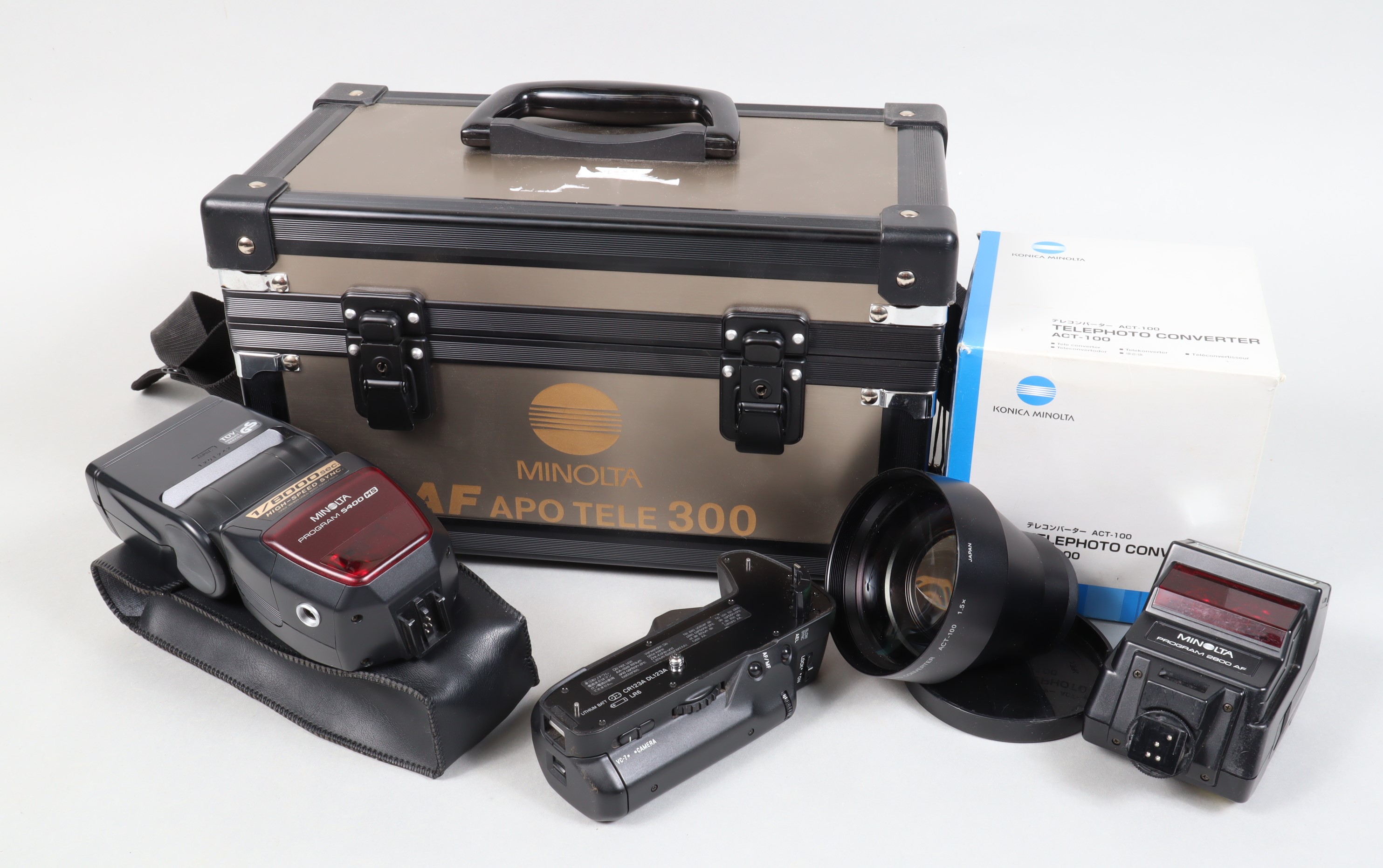 Minolta Accessories, a Konoca-Minolta Telephoto Converter ACT-100, G-VG, in maker's box, a Minolta