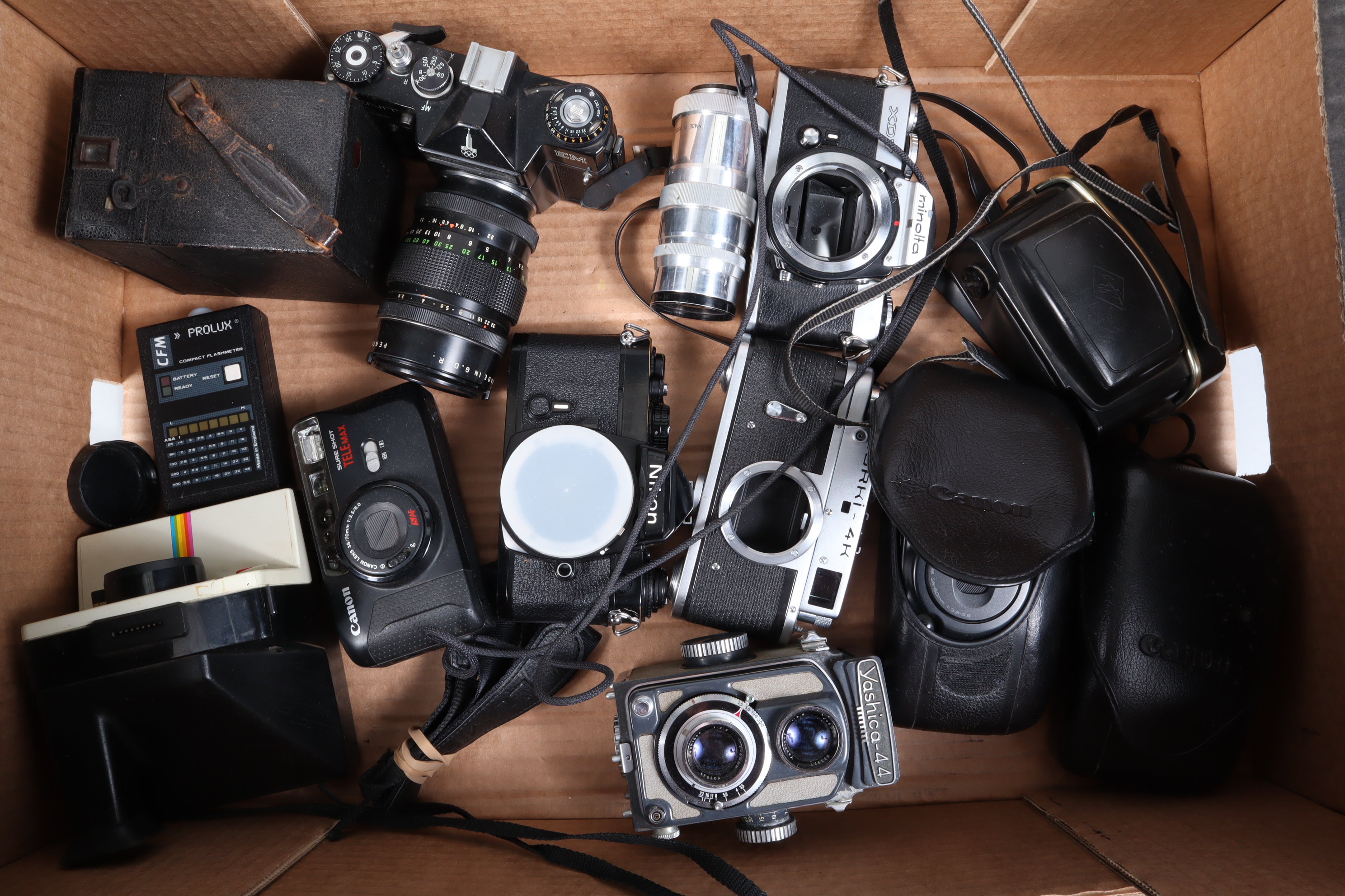 A Tray of Various Cameras, including Sureshot Telemax, Zoom-S 92) compacts, untested, a Zenit E,