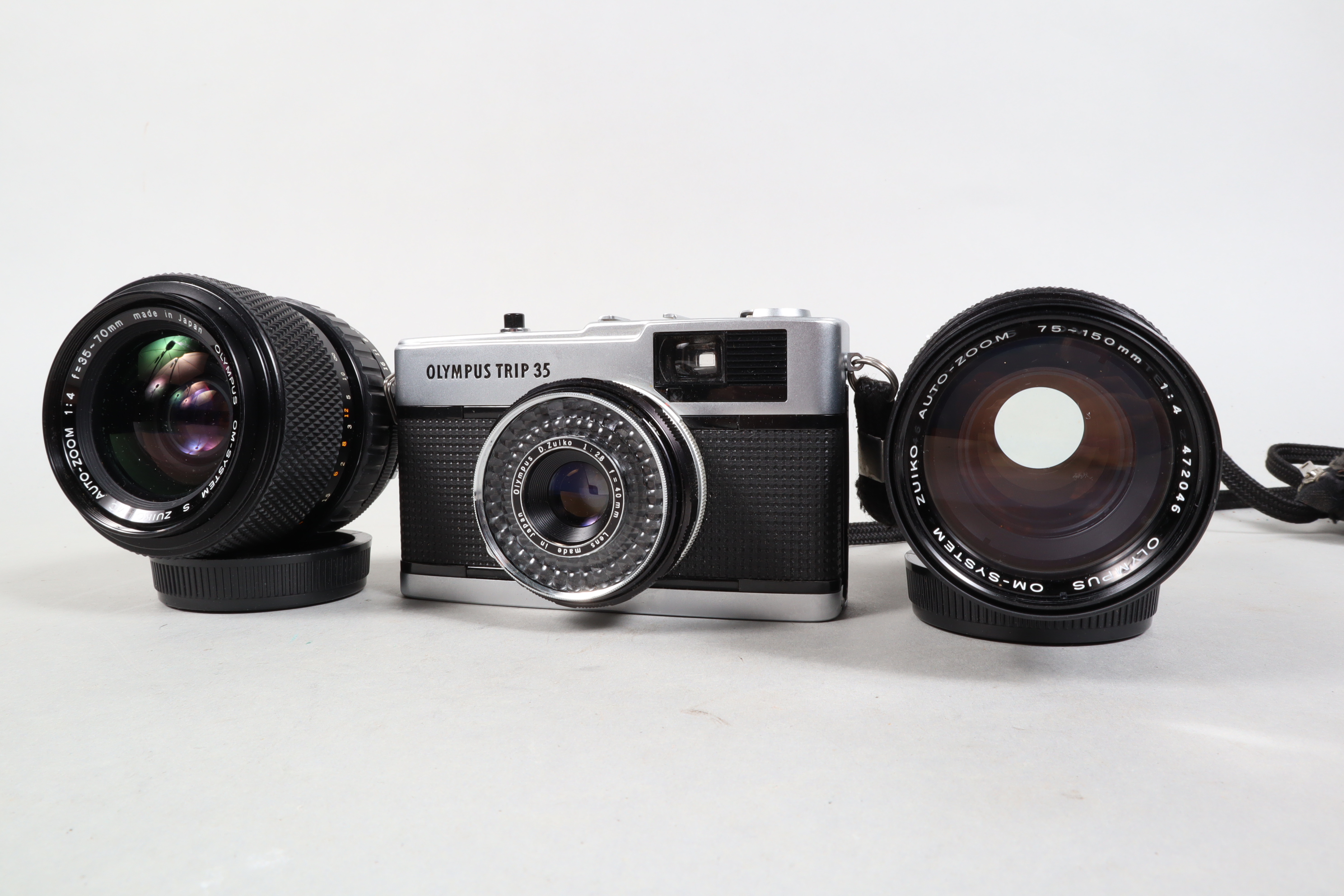 Olympus, Trip 35, good, shutter works, some scratching to base, and OM Zoom Zuiko Lenses - f/4 75-