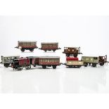 A Hornby 0 Gauge No 101 clockwork 0-4-0T Locomotive and assorted rolling stock, the loco in