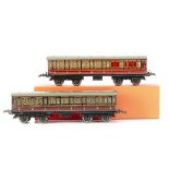 Two Hornby 0 Gauge No 2 Passenger Coaches, as brake/3rd no 22705 in lithographed LMS crimson, and