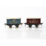 Hornby 0 Gauge 'OAG' Biscuit Vans, both with hinged doors and nickelled wheels, one Carr's