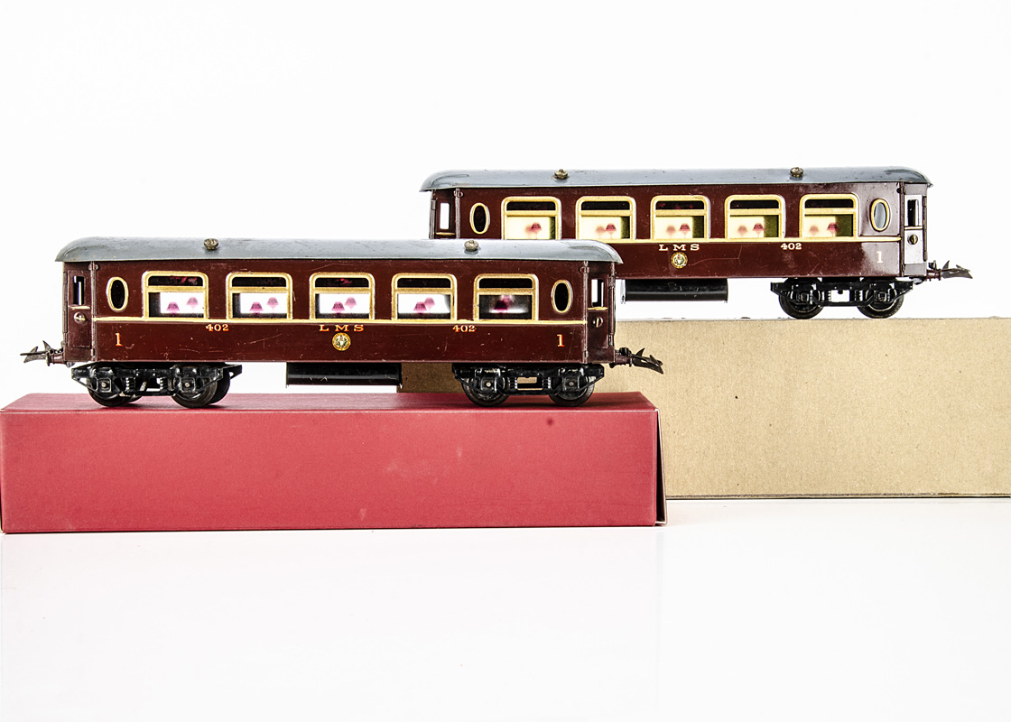 Two Hornby 0 Gauge No 2 LMS 1st class Saloon Coaches, both in enamelled LMS crimson as no 402, one