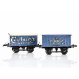 Hornby 0 Gauge Private Owner Vans, both on black T3 bases, one Cadbury's Chocolates van in blue with