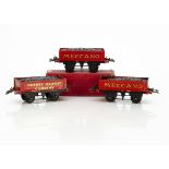 Hornby 0 Gauge No 1 Coal Wagons, two in 'Meccano' red, both with a little well-matched retouching,