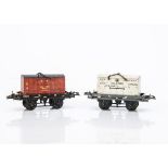 Uncommon post-war Hornby 0 Gauge SR and GW flat wagons with Containers, a dark brown SR wagon No