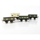 Early Hornby 0 Gauge Pre-grouping Freight Stock, three with 'T1' type (solid) bases and thick axles,