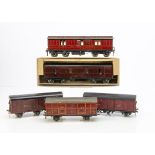 Wood-built 0 Gauge LMS Vans, all in LMS crimson, a 2-axle Milk Traffic van No 7261, and 6-wheel