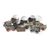 An assortment of Hornby 0 Gauge Clockwork Mechanisms, including an early No 2 motor fitted for '