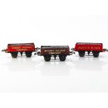 Hornby 0 Gauge 'T3-base' Coal Wagons, one 'Meccano' and one 'Hornby Railway Company' wagons in red