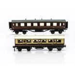 A Bing 0 Gauge 1921-series LNWR bogie Coach and LMC Bakelite-bodied LMS Coach, the 1st class LNWR