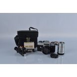A Leicaflex SL camera, serial no. 1215915. With Leitz Wetzlar Summicron-R 1:2/50 2265898 lens, and