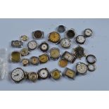 A quantity of assorted trench watch and wrist watch faces, including steel cased and nickel cased