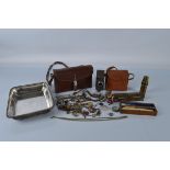 A mixed lot of collectables, including a Bell & Howell 134 Movie Camera, fob compasses, silver