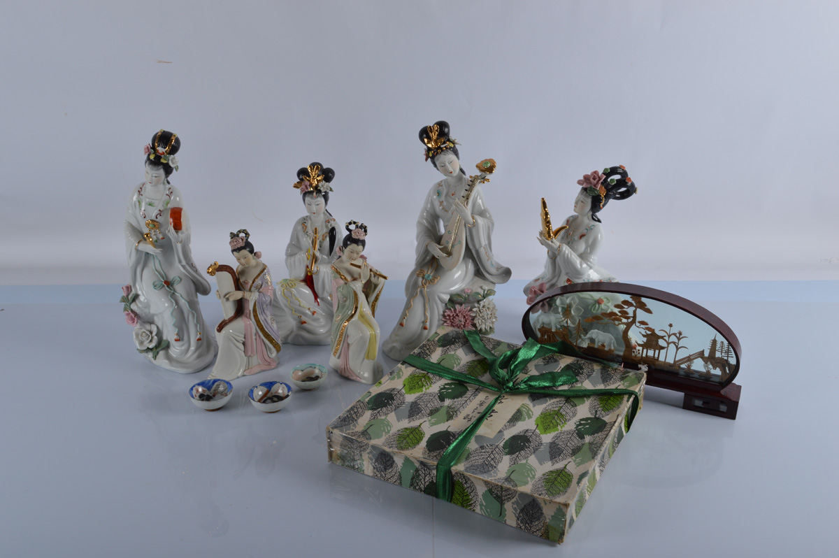 A quantity of figurines, including various Japanese and oriental figures of musicians, and a boxed