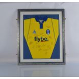 A 2003 Birmingham City FC signed shirt, featuring seventeen signatures, framed and glazed. 77 x 90cm