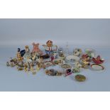 A mixed lot of assorted ceramics and ornaments, including a ivory netsukes, a Natwest Pig, costume