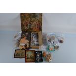 A quantity of doll making and repairing items, including hands, eyes, cotton reels, needles,