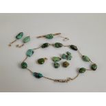 A collection of turquoise matrix jewellery, including a necklace united by yellow metal chain, bar