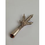 An early 20th Century silver plated and simulated citrine claw brooch, with engraved design and
