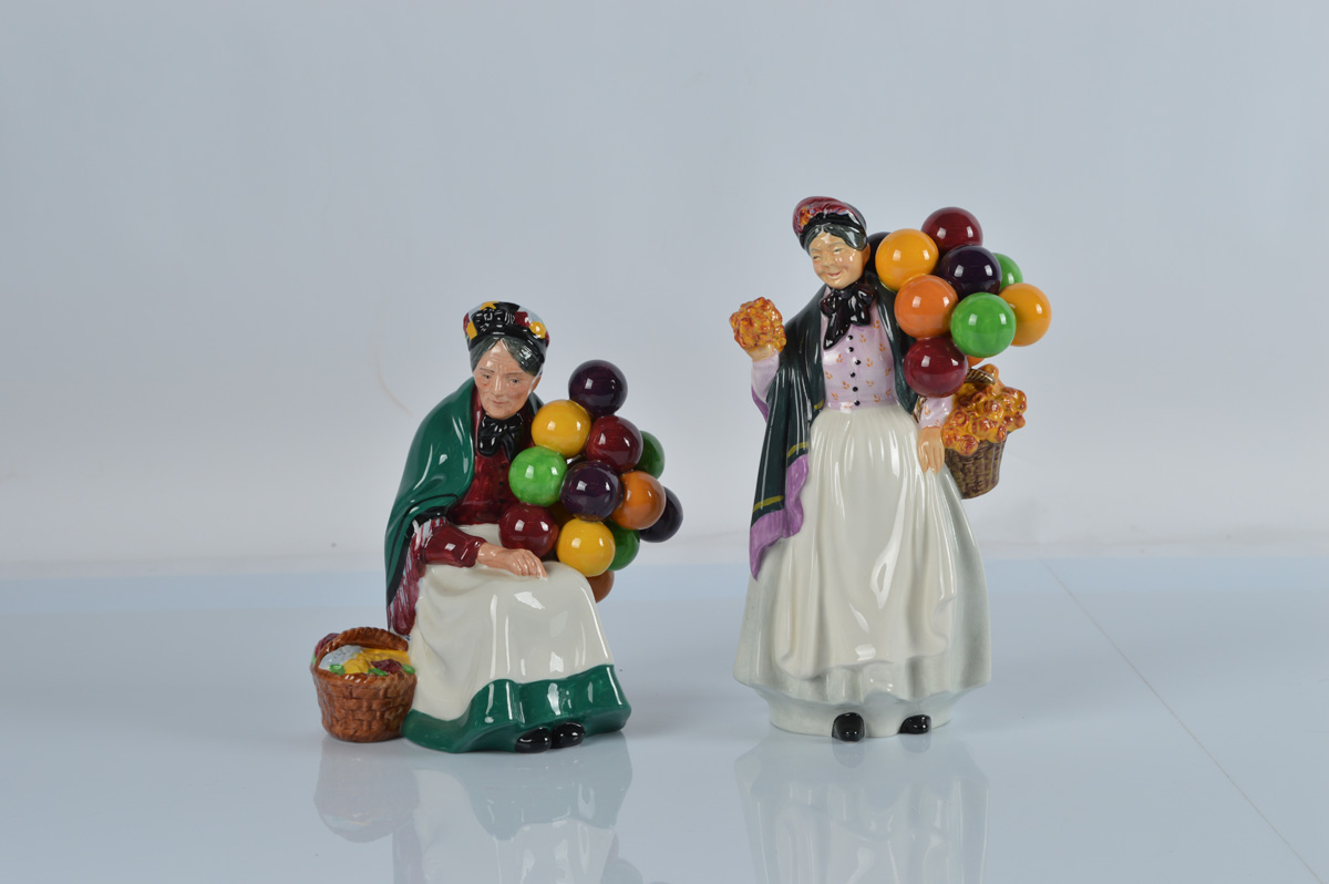 Two Royal Doulton figures, Biddy Pennyfarthing HN 1843 and The Old Balloon Seller HN 1315 (2)