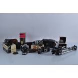 A good collection of assorted cameras, lenses and related equipment, including a Soligor tele-auto