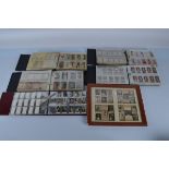 A large collection of cigarette cards, contained in five albums, some AF with water damage