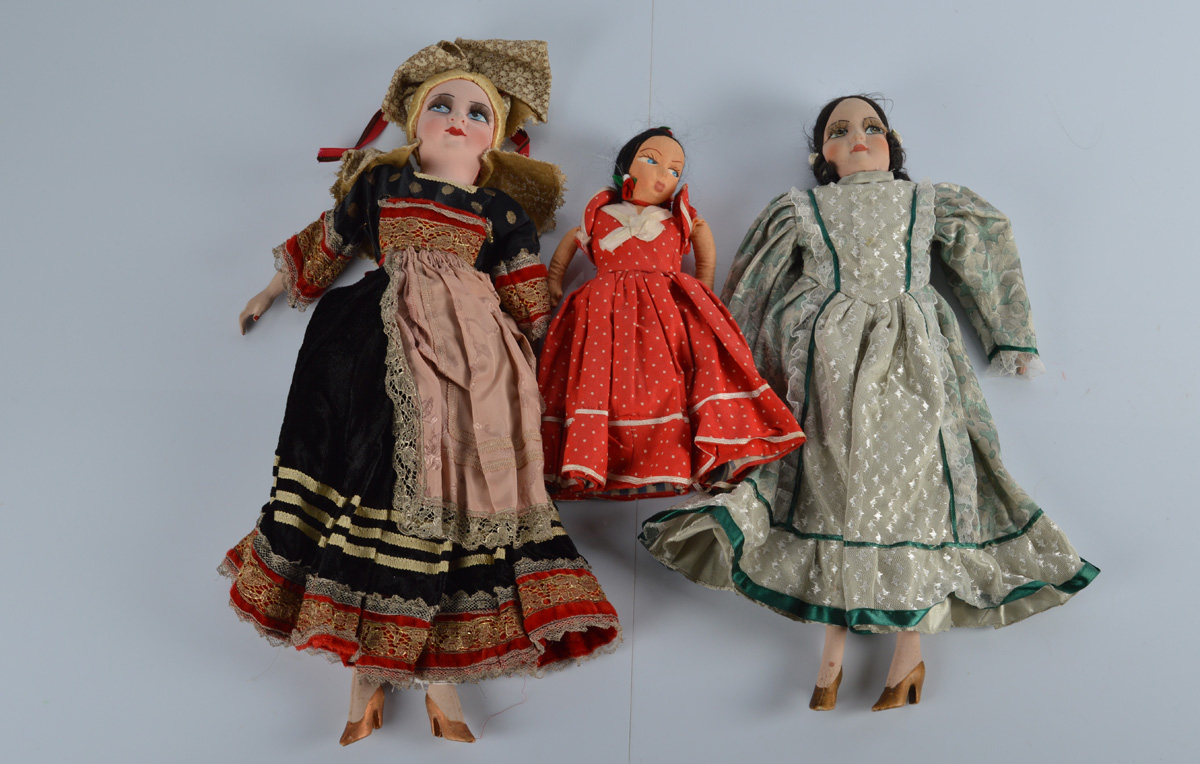 Two French boudoir dolls, with stockinette heads, stuffed bodies and composition limbs, one in