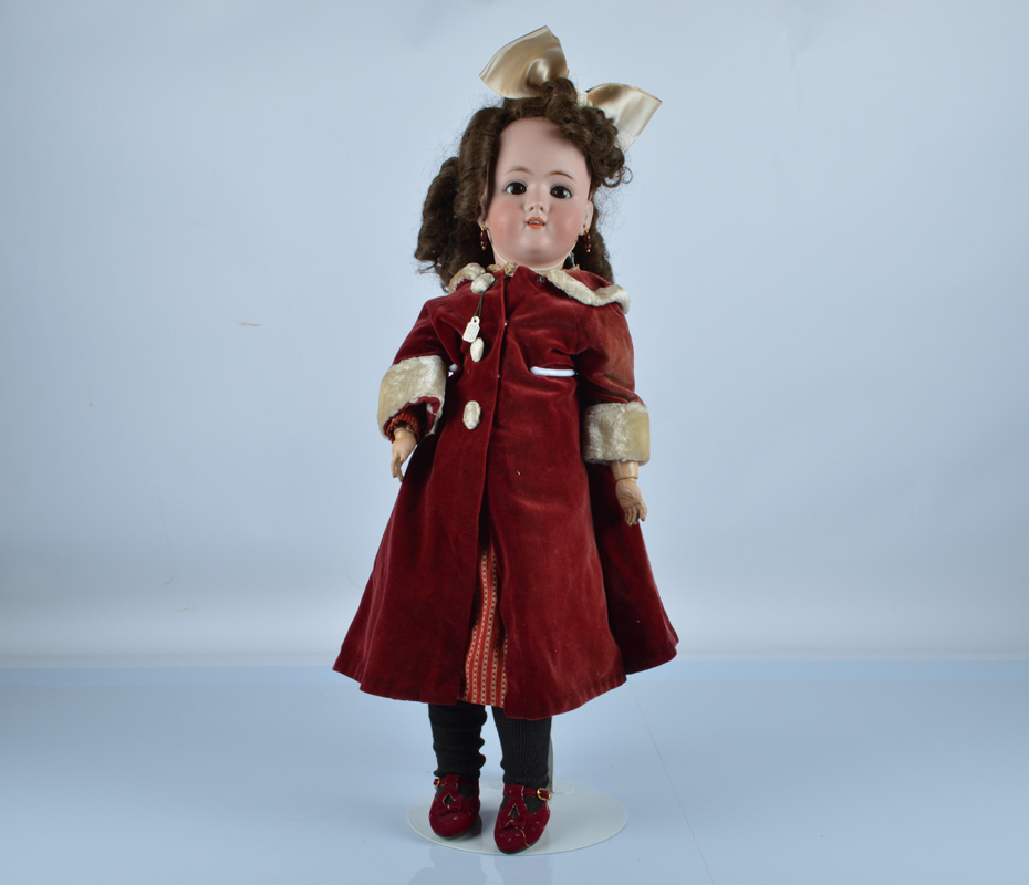 A Simon and Halbig for Heinrich Handwerck child doll, with brown sleeping eyes, pierced ears,