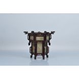 A Chinese carved wood lantern, of hexagonal form with painted glass panels (3 missing. 25cm tall x