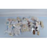 A quantity of doll accessories, including knitted gloves, socks, fur stoles, hand muffs and others