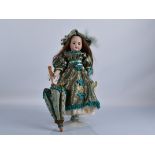 An SFBJ 60 child doll, with dark, sleeping eyes, replaced brown wig, jointed papier mache body and