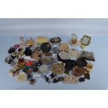 A quantity of miniature coin purses, together with various bead and clutch bags dating from the