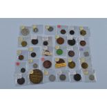 A collection of thirty assorted mostly 18th and 19th century tokens and coins, areas of interest