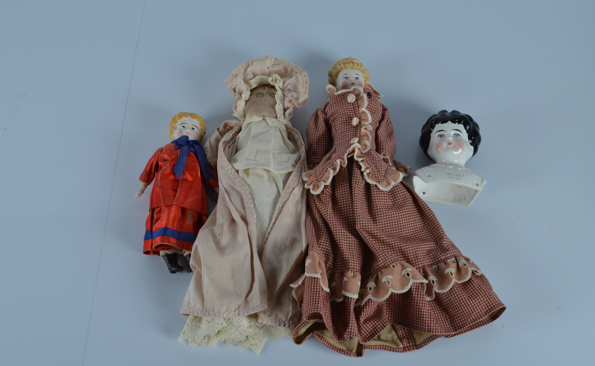 A china shoulder head Helen doll, head turned slightly to the right, Helen embossed on moulded