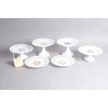 A nice Edwardian period Staffordshire porcelain set of floral decorated plates and cake stands,